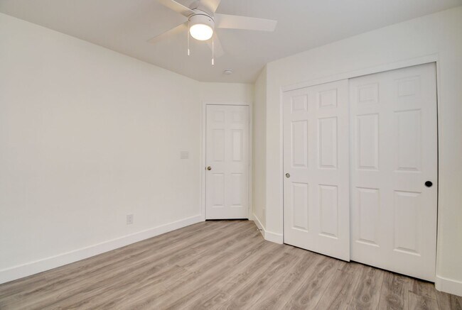 Building Photo - Great home with 4 bedrooms, 2.5 baths. New Floors Paint and Countertops.