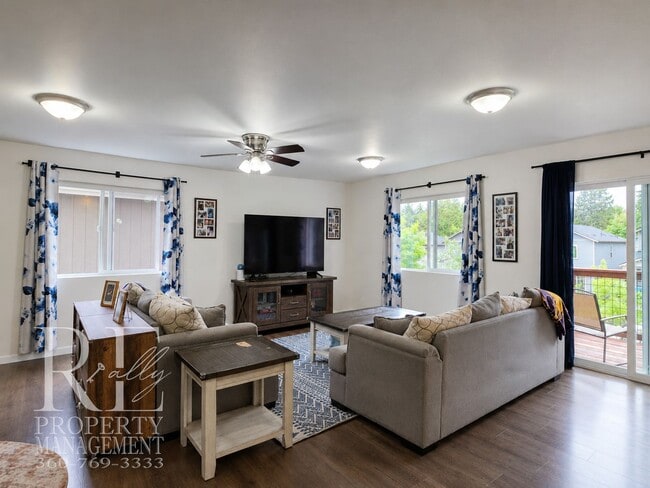 Building Photo - Spacious 3-Story Home with Flexible Living Space, Heat Pump & Private Deck Retreat