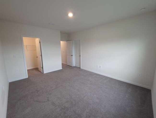 Building Photo - Fresh new build ~ 3 bed/ 2.5 bath Townhous...