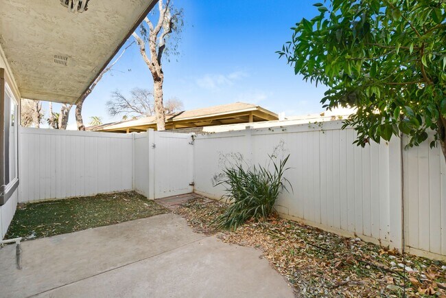 Building Photo - Coming Soon! Well, maintained 3-bedroom, 2.5 bath corner unit town home in a private, gated commu...