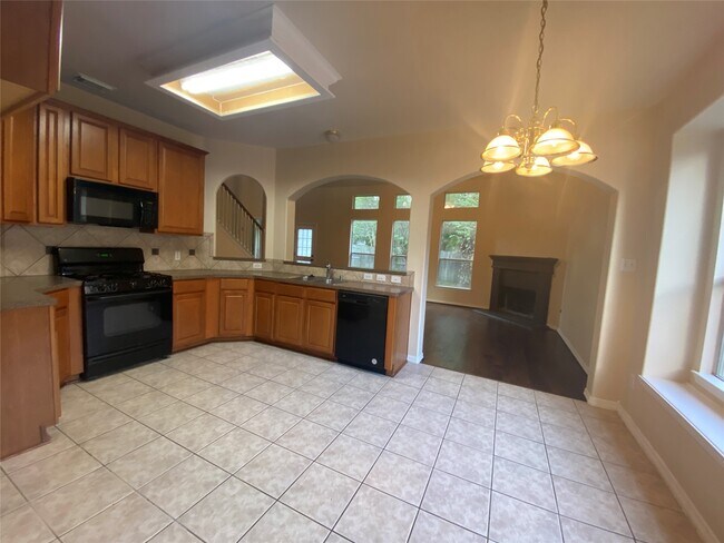 Building Photo - 9210 Hidden Lake E Dr