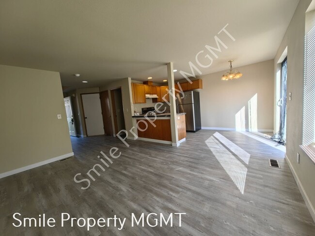 Building Photo - Recently updated New LVP Flooring, New Interior Painting, New Refrigerator.