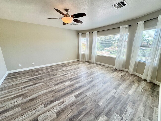 Building Photo - Pristine Single Level 3 Bedroom Home In The Sought After Gated Lagos Vistoso Community in Chandler!