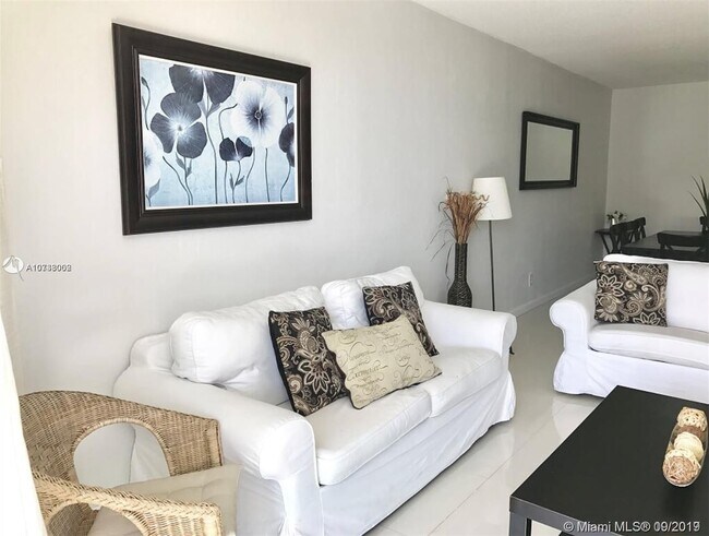 Building Photo - 19370 Collins Ave