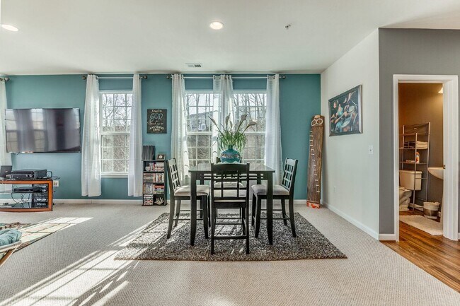Building Photo - 3-bedroom, 2.5-bathroom condo with a great open-concept main level.