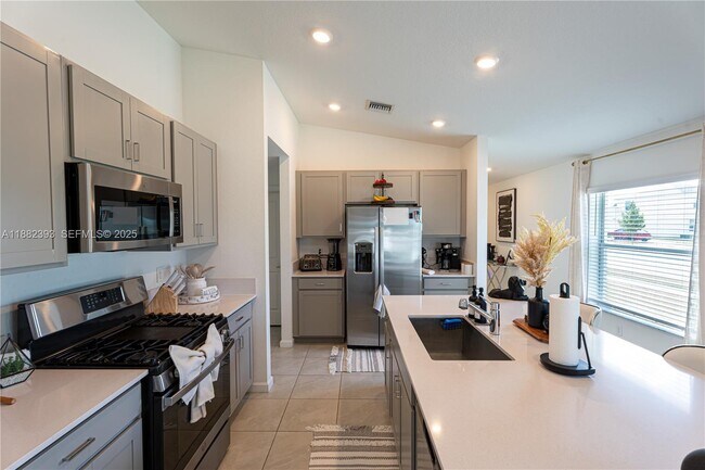 Building Photo - 6172 NW Sweetwood Dr