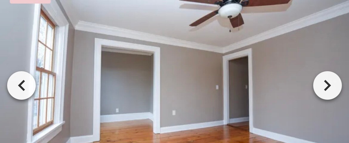 Living room looking into den / office space - 126 N College St