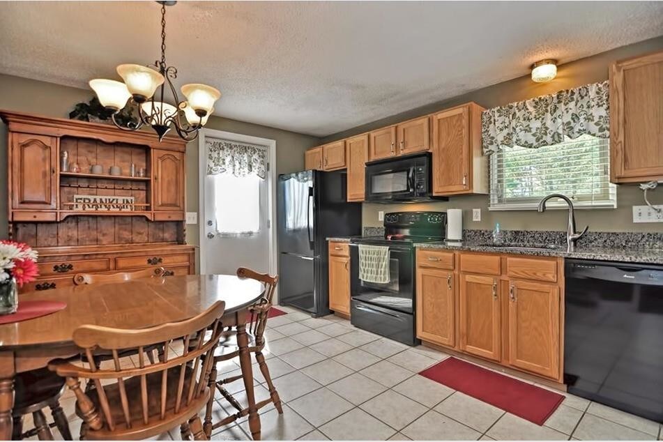 New flooring has been installed - see photos at end of listing - 98 Hayward St