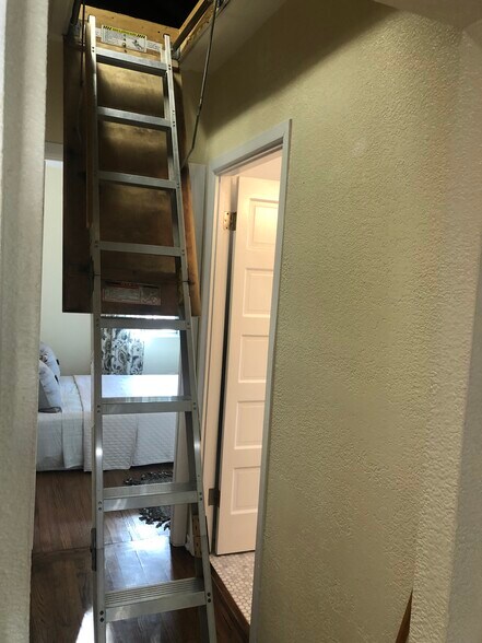 Pull down stairs for attic access. - 2208 Gramercy Ave