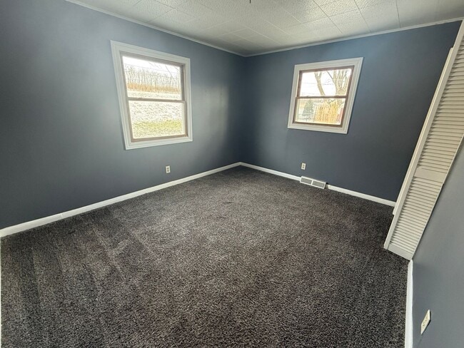 Building Photo - Check Out this Renovated House in a Quiet Neighborhood with a Large Yard!