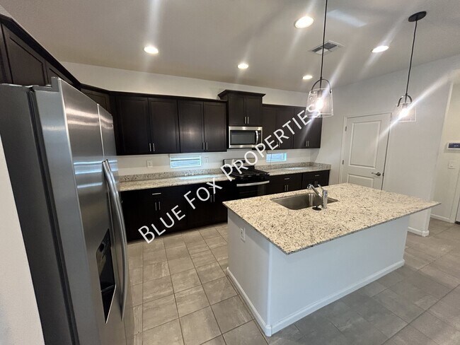 Building Photo - 6973 W Jadewood Ln