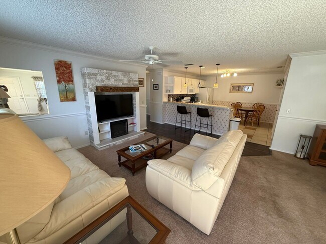 Building Photo - Delightful Turnkey Furnished, 2 bed, 2 Bath Patio Villa available for ANNUAL LEASE