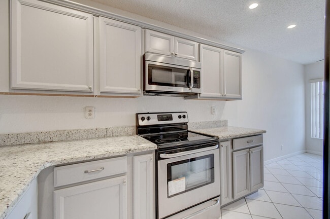 Building Photo - 5710 Princess Palm Ct