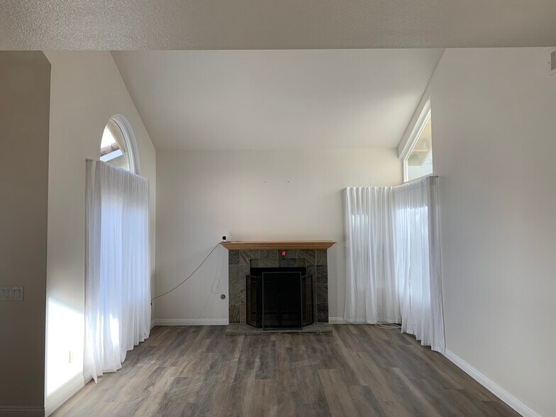 Living room with fire place - 10734 Chinon Cir