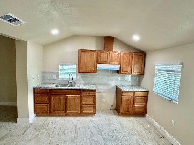Building Photo - Your new home is here! Enjoy the charm of ...