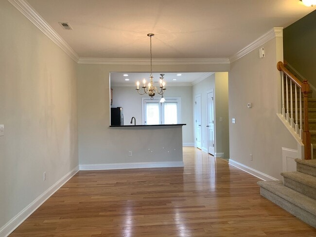 Building Photo - PRIME LOCATION, 3 Bedrooms Suites Apex TH Near HWY, Schools, Shops and Community Amenities!