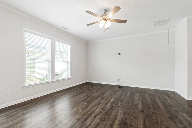 Building Photo - Stylish 4-Bedroom Townhome with Backyard O...