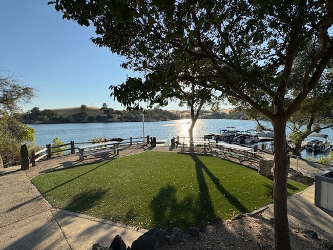 Building Photo - Move in special: $500 off first months rent! Home located in a gated Lakefront community with 3 s...