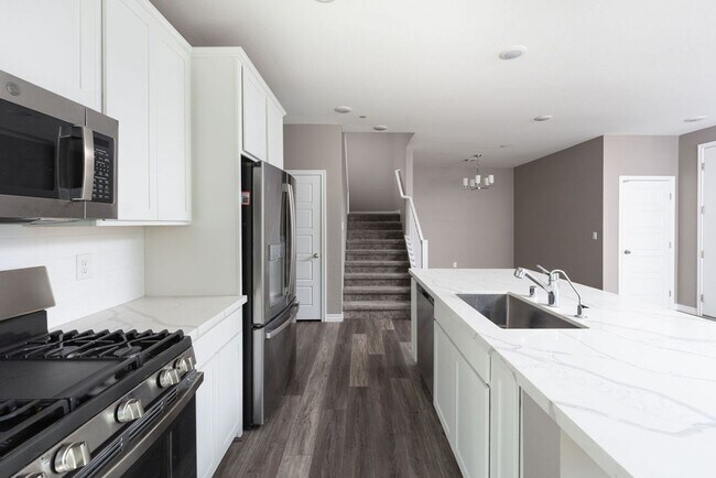 Building Photo - Modern Henderson Townhome with Loft & Resort-Style Amenities
