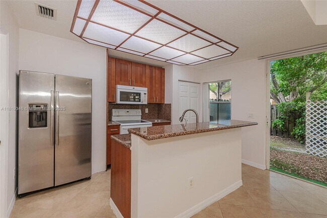 Building Photo - 4958 White Mangrove Way E