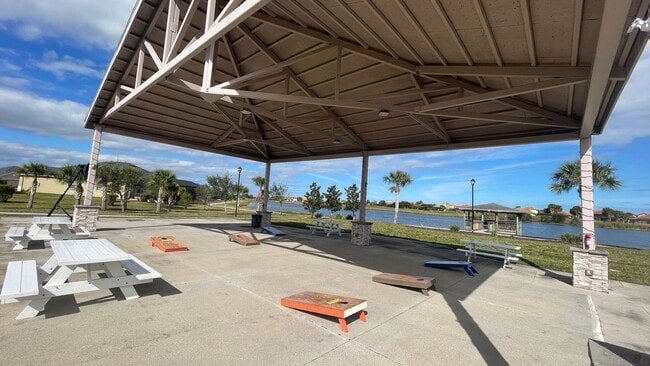 Building Photo - Elevated Luxury at The Terraces – 4th Floor Lake & Golf Course Views! 55+ Community!