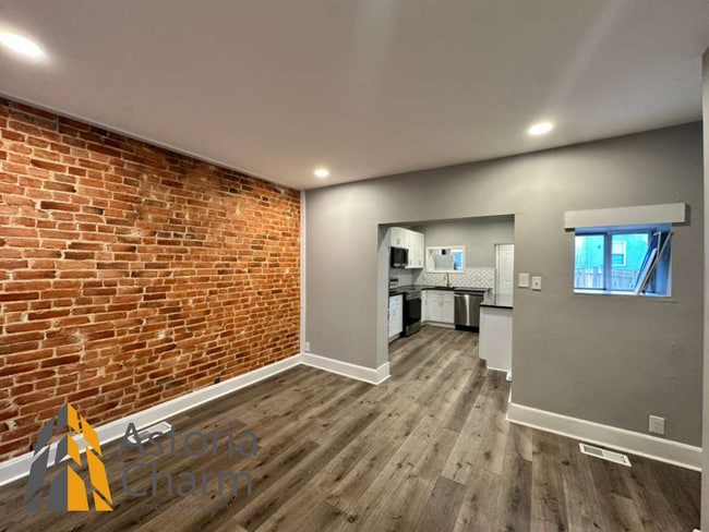 Building Photo - 2 Bedroom Home with Den, Exposed Brick, and Updated Kitchen in Westport