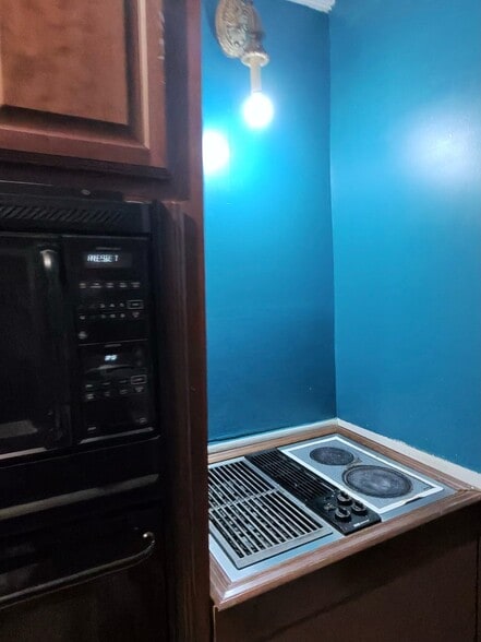 Kitchen stove and microwave - 219 West Bell Street