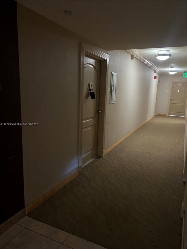 Building Photo - 3675 N Country Club Dr