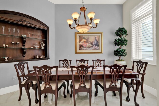 Building Photo - Elegant 4-Bedroom Pool Home in Exclusive G...