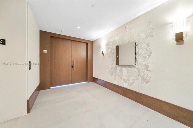 Building Photo - 10203 Collins Ave