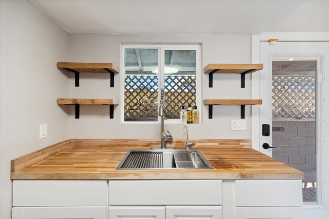 plenty of cabinet and shelf space in the kitchen - 327 N 16th Ave