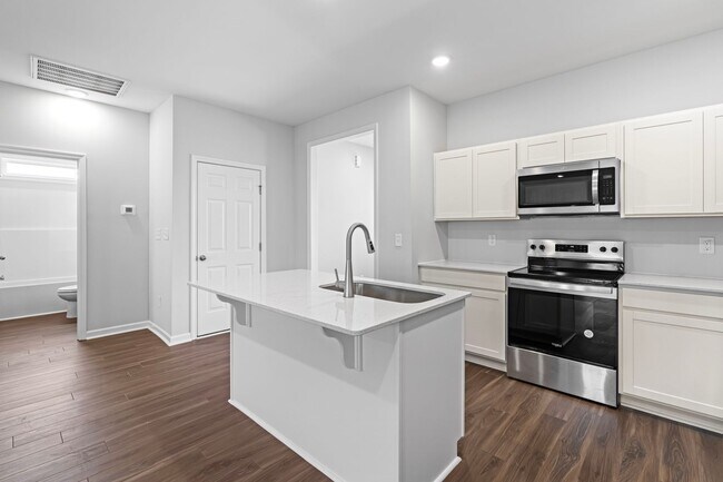 Building Photo - Move-In Special: Save $500 on Your First M...