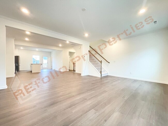 Building Photo - Brand New 3 Story, 4 bedroom, 3.5 bathroom Townhome Featuring a 1st floor Guest Suite, 2 Car Gara...