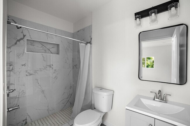 Building Photo - Brand new 1-bedroom, 1-bathroom 1 bath designed for those who value both style and substance