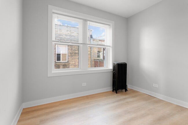 Building Photo - 7383 N Damen Ave