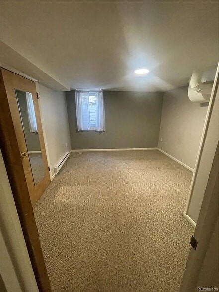 Bedroom- Large european window brings in lots of natural light - 1210 Vance St