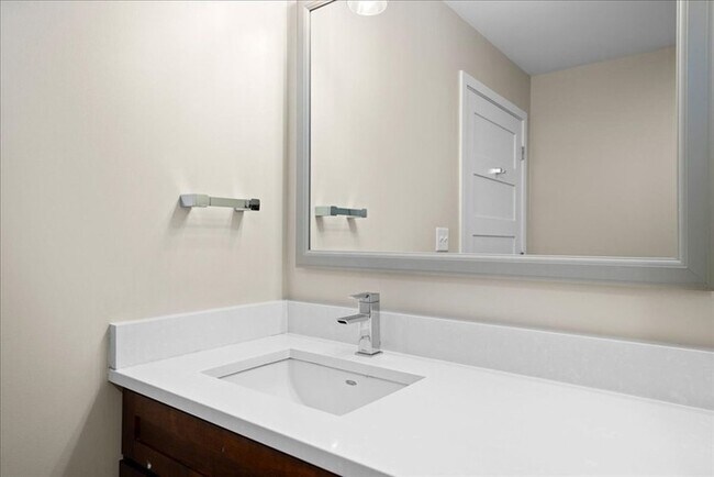 Building Photo - Stylish Industrial Loft with Exposed Brick, High Ceilings & Modern Kitchen