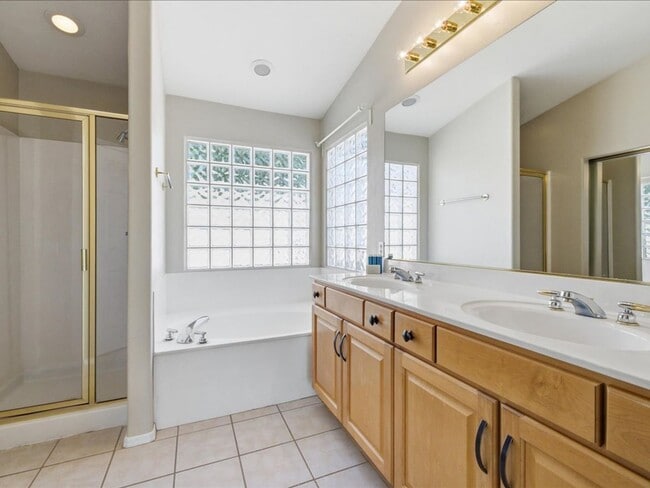 Building Photo - Spacious Living in a Gated Community with Amenities!