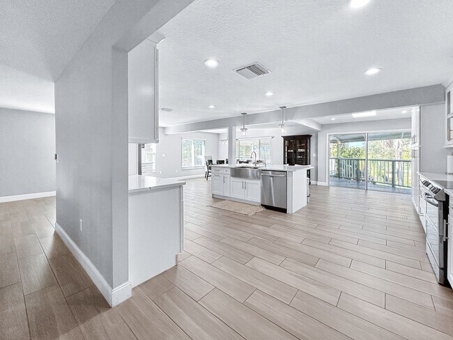 Building Photo - 4 Bed Waterfront Paradise with Pool, Dock & Gulf Access in Baileys Bluff