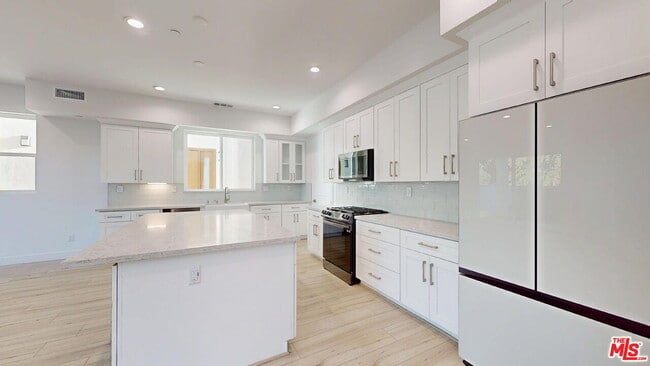 Building Photo - 8474 N. Camelia Court