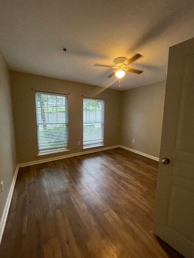 Building Photo - Two Bedrooms Available in this Three Bedroom Flat, Female Applicants!