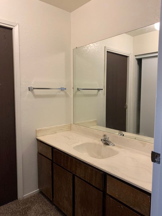 Building Photo - ENJOY THE POOL THIS SUMMER IN THIS GATED C...