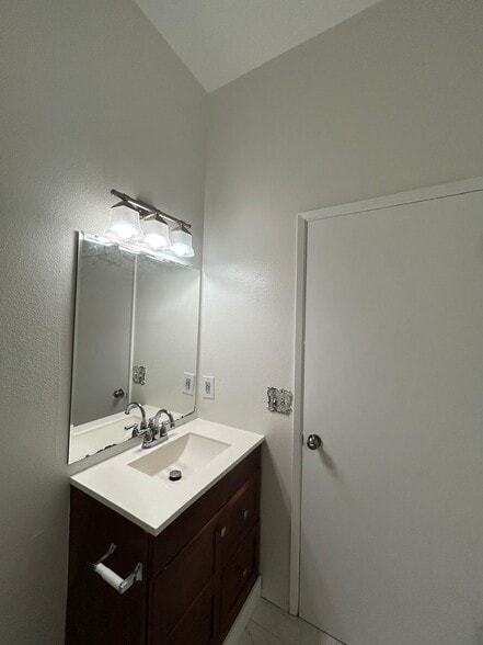 Bathroom new faucet - 8526 16th Ave NW