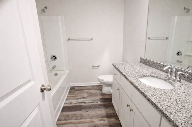 Building Photo - COMING SOON: 3BR Townhome • Full Kitchen • Garage + Driveway