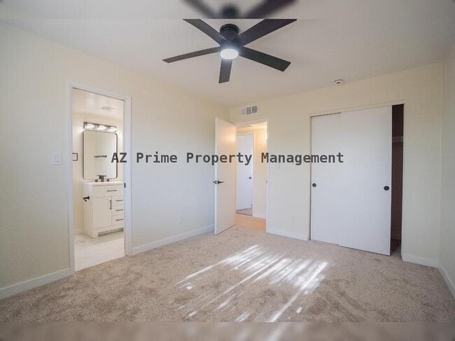 Building Photo - 3142 N 78th Dr