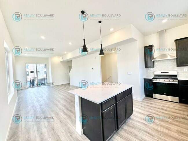 Building Photo - Modern 2 Bedroom 2Bath Townhome with Dual Patios & Designer Finishes near Truckee River