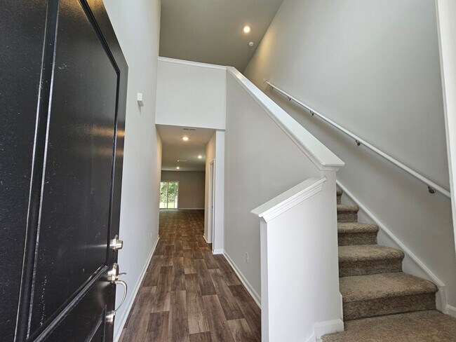 Building Photo - New 5 Bedroom/ 2.5 Bath Home