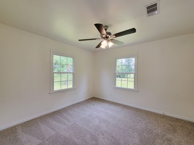 Building Photo - REMODELED 4 BEDROOM 2 BATH LEASE HOME IN A...