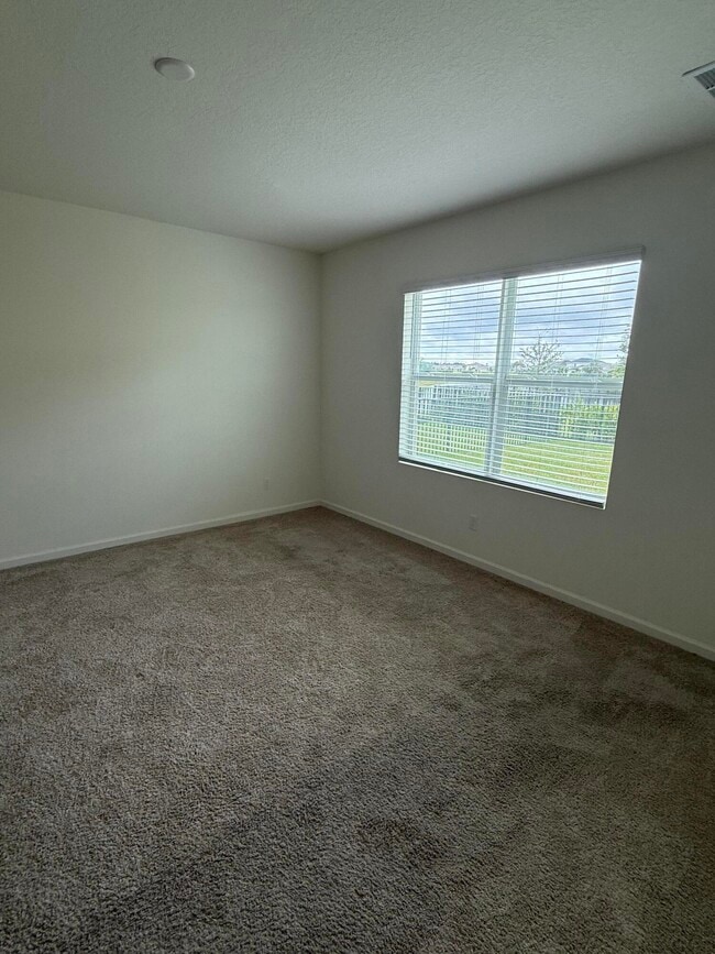 Building Photo - 10997 SW Vasari Way