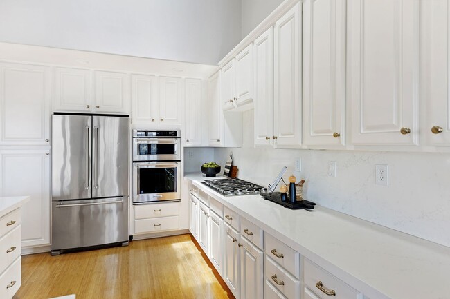 Building Photo - Spacious 4-Story Townhouse with Panoramic ...